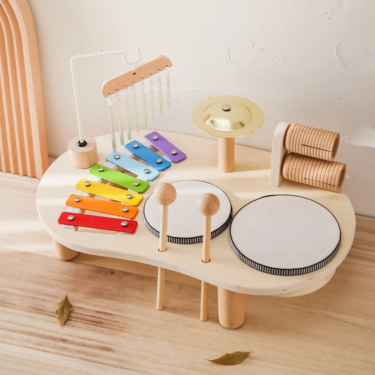 wooden instrument set with drums and xylophone