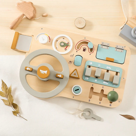 childrens wooden steering wheel with lots of buttons and detailing 