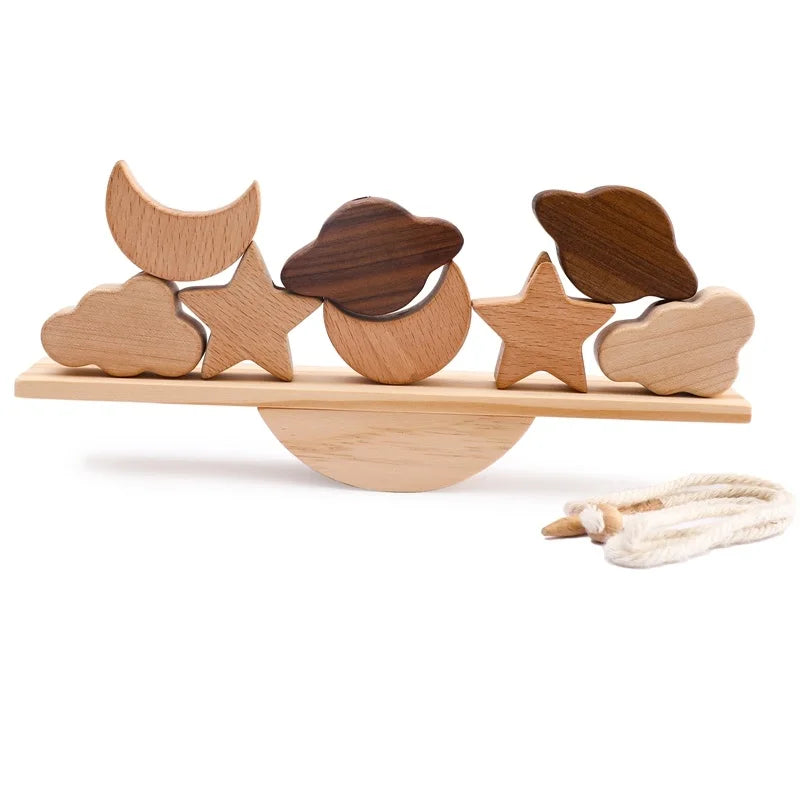 Wooden balance board with stars and thread for threading game