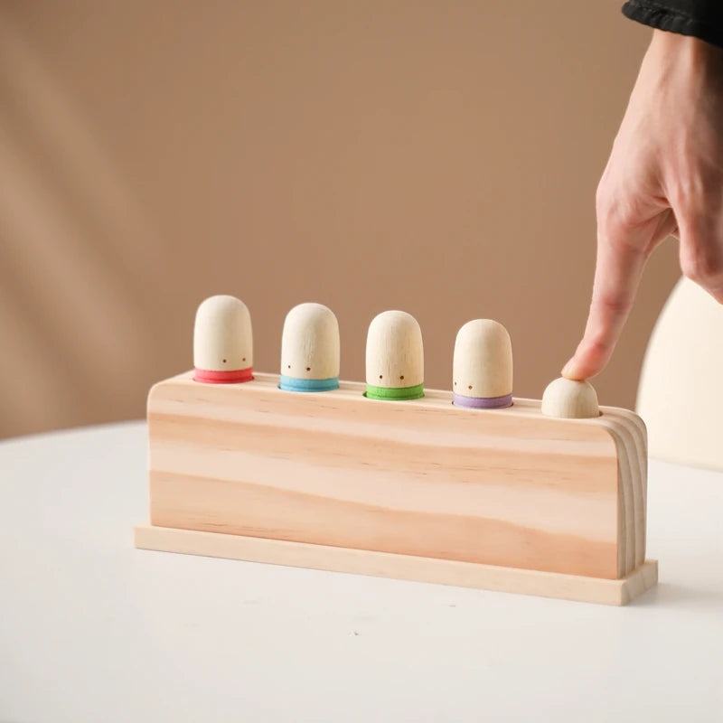 bouncing montessori toy with 5 figures in multicolour