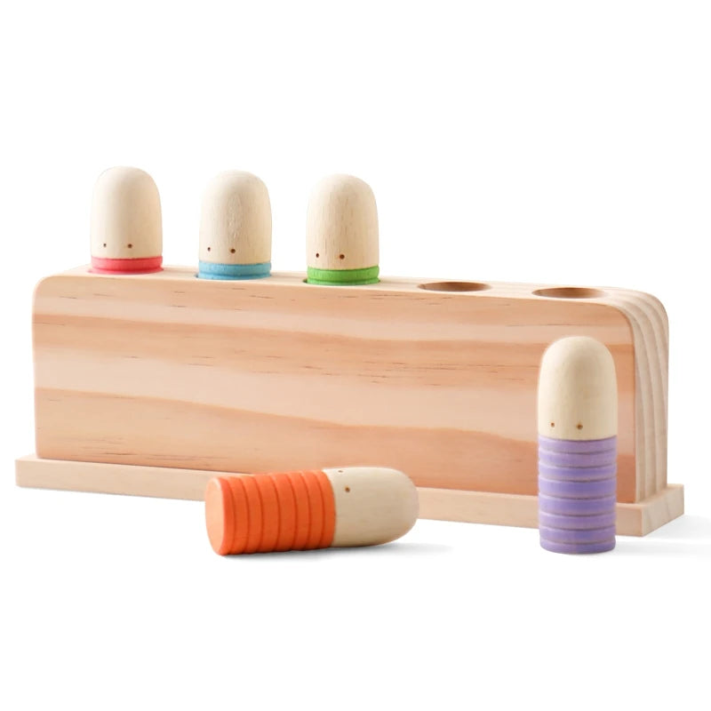 5 pop up wooden montessori figures in different bright colours  - game for children