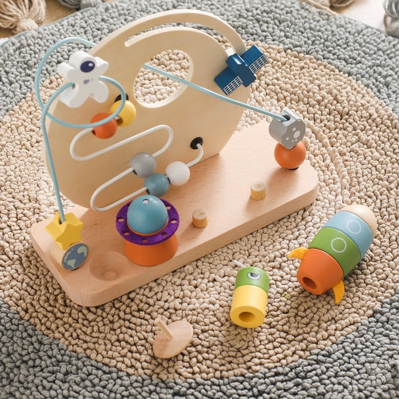 wooden space toy for children on carpet 