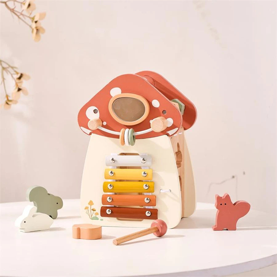 mushroom wooden kids toy on white table 